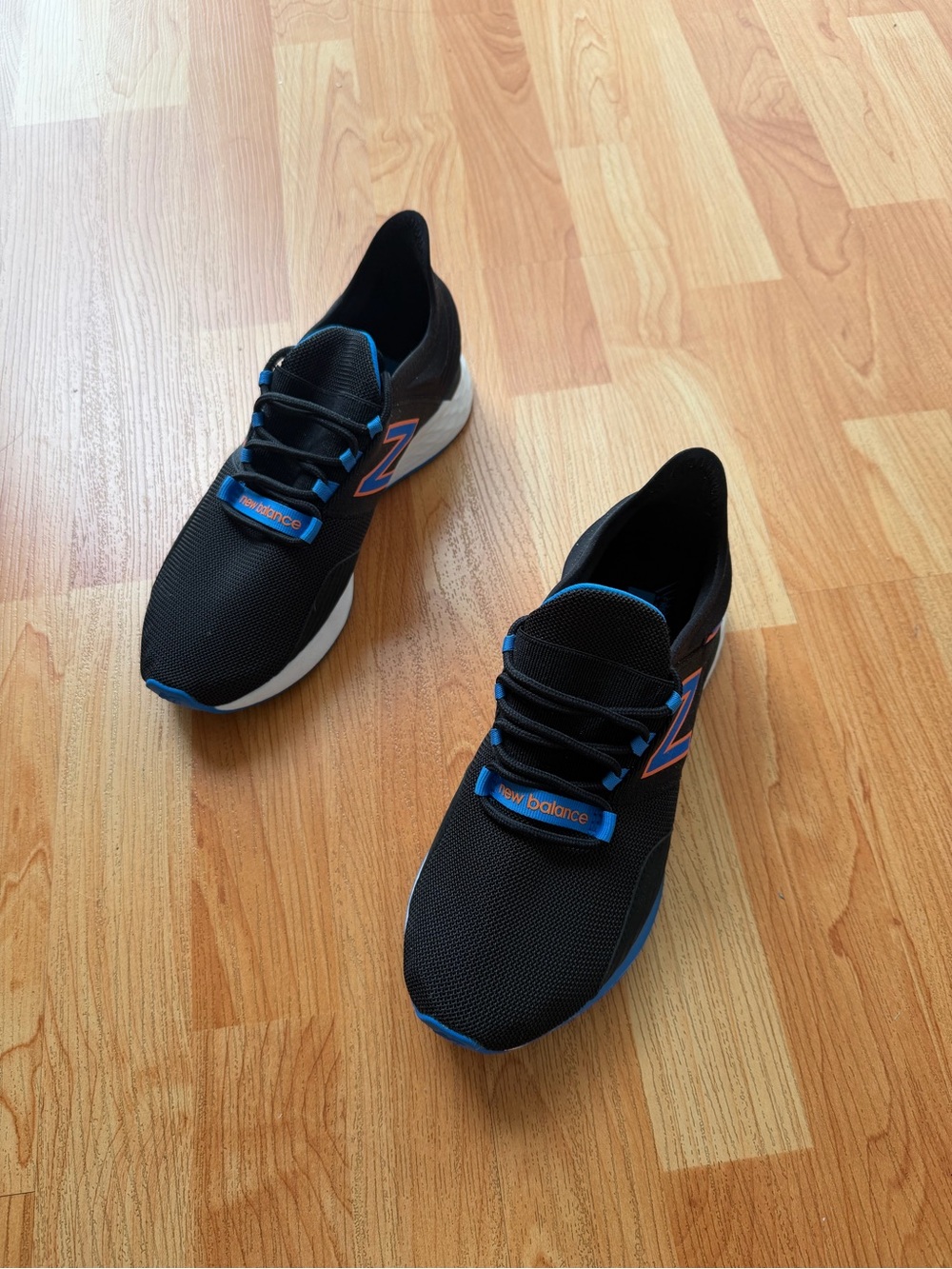 New Balance Women’s Black with Blue Trim Running Sneakers